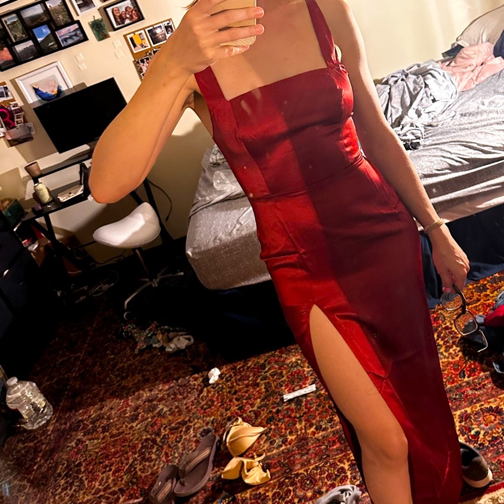 Red silk Reformation Solvang dress in size 6 - midi length with slit.
